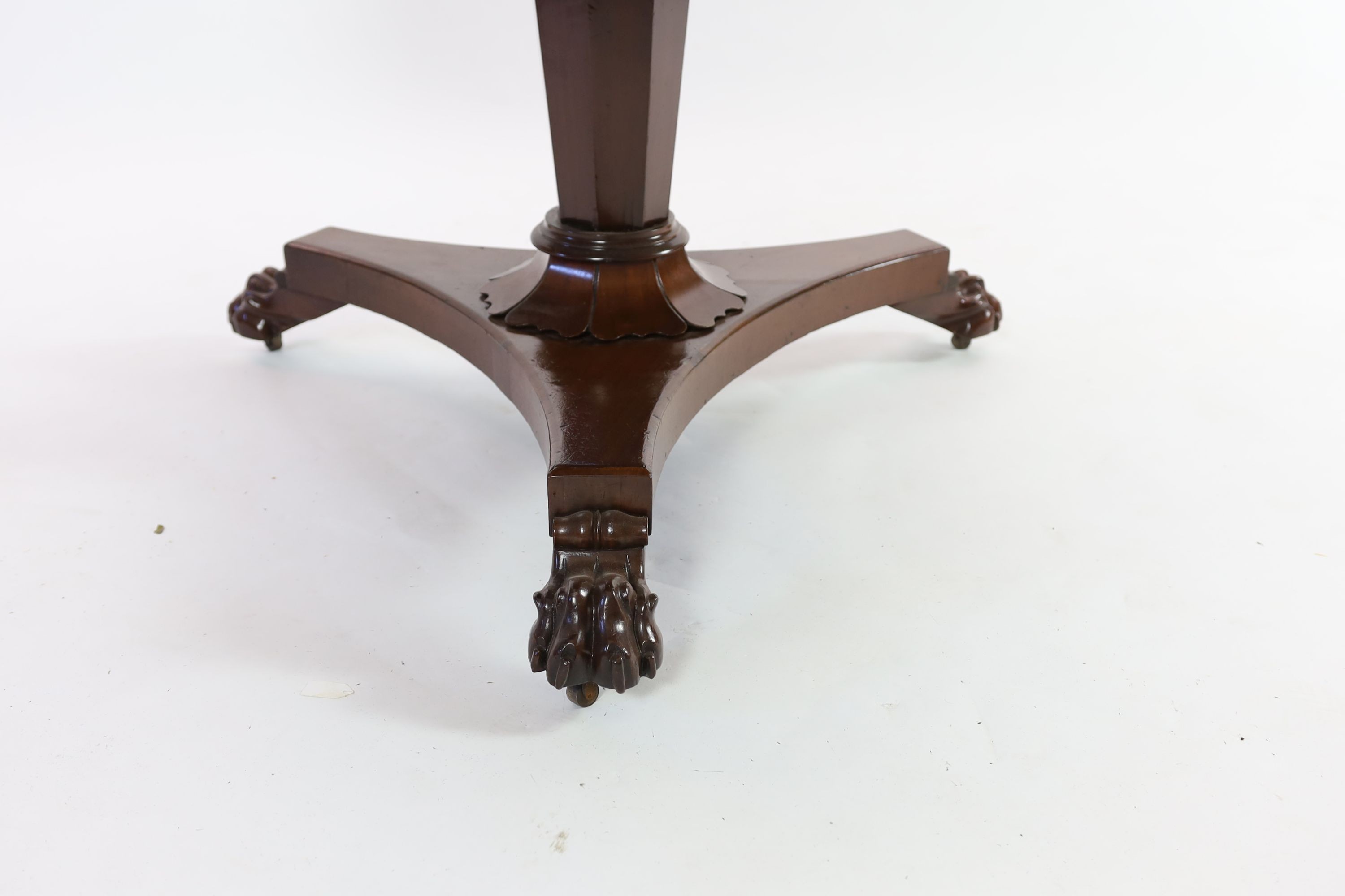 A William IV circular mahogany tilt top breakfast table, on octagonal tapered pillar, diameter 116cm height 73cm